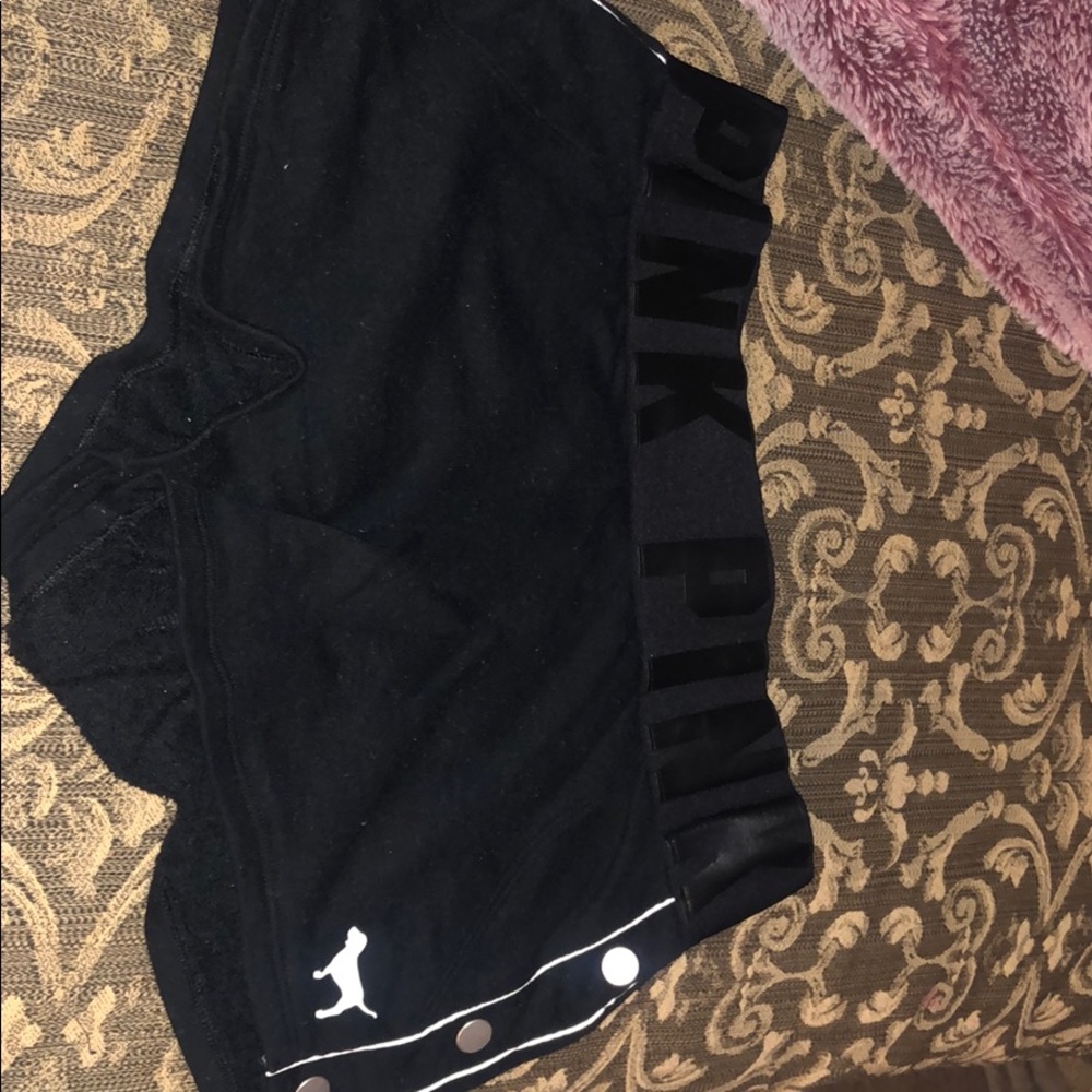 Pink VS black shorts